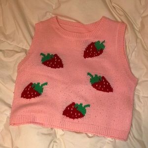 Xs women’s pink strawberry pattern sweater vest, slightly cropped.